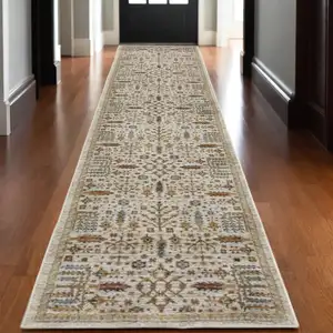 Photo of 12' Ivory And Gold Oriental Runner Rug