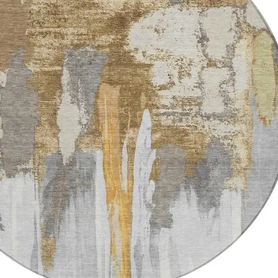 8' Ivory And Gold Round Abstract Washable Indoor Outdoor Area Rug Photo 7