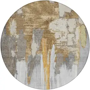 Photo of 8' Ivory And Gold Round Abstract Washable Indoor Outdoor Area Rug