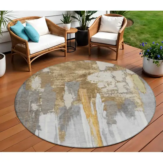 8' Ivory And Gold Round Abstract Washable Indoor Outdoor Area Rug Photo 2