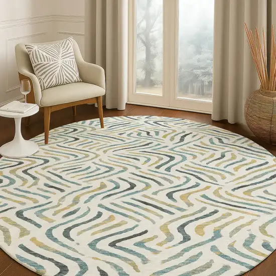 8' Ivory And Gold Round Abstract Washable Indoor Outdoor Area Rug Photo 5