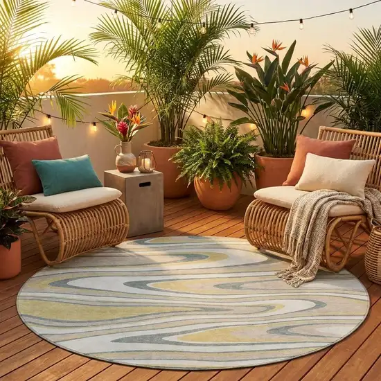 8' Ivory And Gold Round Abstract Washable Indoor Outdoor Area Rug Photo 1