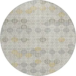 Photo of 8' Ivory And Gold Round Geometric Washable Indoor Outdoor Area Rug