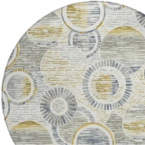 8' Ivory And Gold Round Geometric Washable Indoor Outdoor Area Rug Photo 4