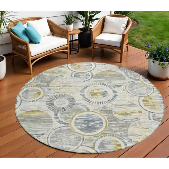 8' Ivory And Gold Round Geometric Washable Indoor Outdoor Area Rug Photo 2