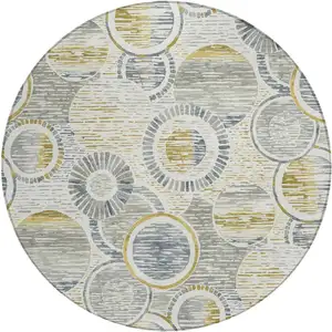 Photo of 8' Ivory And Gold Round Geometric Washable Indoor Outdoor Area Rug