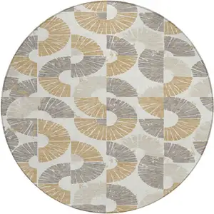 Photo of 8' Ivory And Gold Round Geometric Washable Indoor Outdoor Area Rug