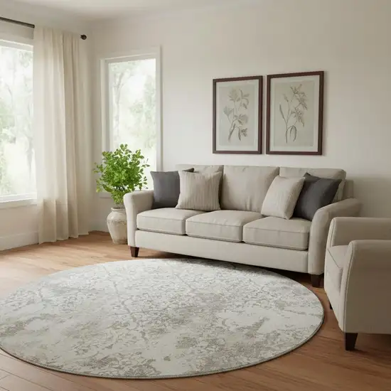 8' Ivory And Gray Abstract Washable Round Rug With UV Protection Photo 1