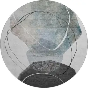 Photo of 8' Ivory And Gray Abstract Washable Round Rug With UV Protection