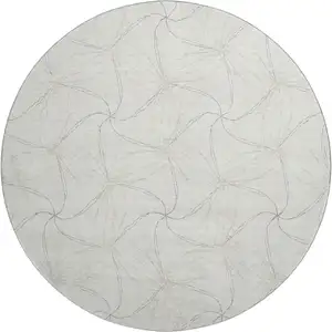 Photo of 8' Ivory And Gray Geometric Washable Round Rug With UV Protection