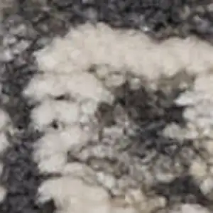 Photo of 8' Ivory And Gray Medallion Distressed Runner Rug With Fringe