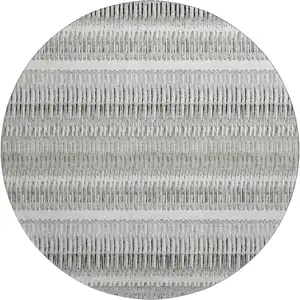 Photo of 8' Ivory And Gray Striped Washable Round Rug With UV Protection