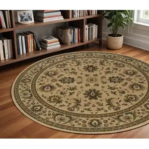 Photo of 8' Ivory And Green Oriental Round Rug