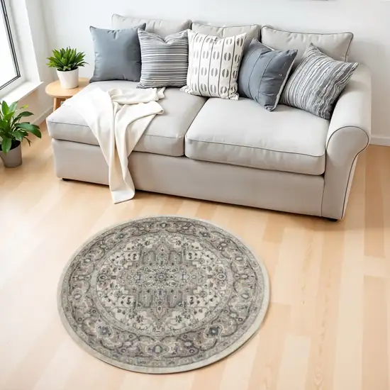 4' Ivory And Gray Oriental Distressed Round Rug Photo 1