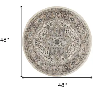 Photo of 4' Ivory And Grey Round Oriental Power Loom Non Skid Area Rug