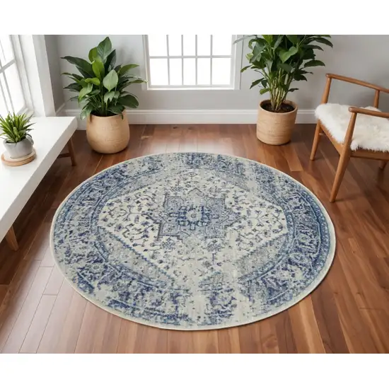 8' Ivory And Light Blue Floral Medallion Distressed Round Rug Photo 1