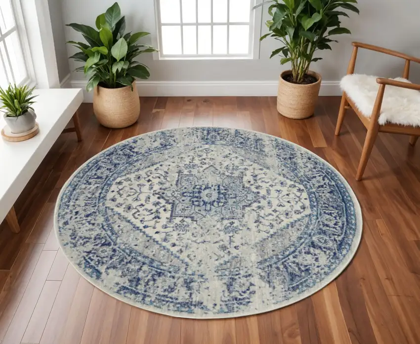 8' Ivory And Light Blue Floral Medallion Distressed Round Rug Photo 1