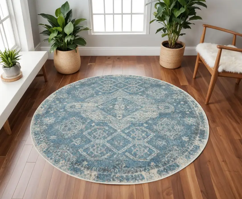 8' Ivory And Light Blue Geometric Distressed Round Rug Photo 1