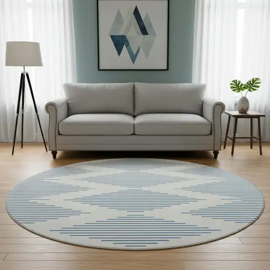 8' Ivory And Navy Blue Geometric Washable Round Rug With UV Protection Photo 2