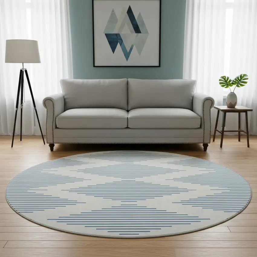 8' Ivory And Navy Blue Geometric Washable Round Rug With UV Protection Photo 2