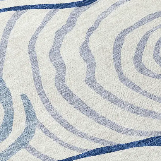 8' Ivory And Navy Blue Round Abstract Washable Indoor Outdoor Area Rug Photo 9