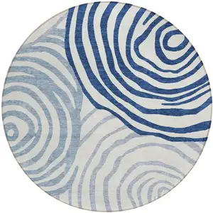 Photo of 8' Ivory And Navy Blue Round Abstract Washable Indoor Outdoor Area Rug