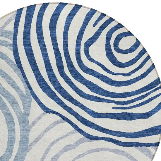 8' Ivory And Navy Blue Round Abstract Washable Indoor Outdoor Area Rug Photo 5