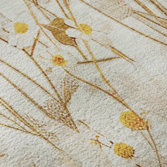 8' Ivory And Orange Floral Washable Area Rug With UV Protection Photo 9