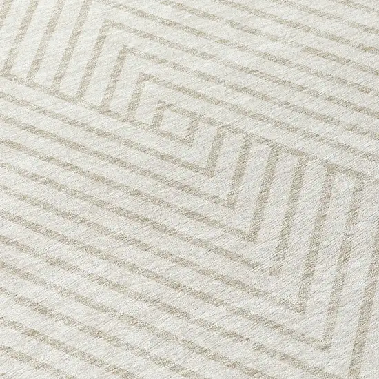 8' Ivory And Pale Beige Round Geometric Washable Indoor Outdoor Area Rug Photo 9