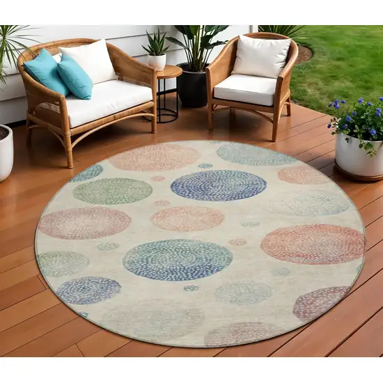 8' Ivory And Peach Round Geometric Washable Indoor Outdoor Area Rug Photo 2