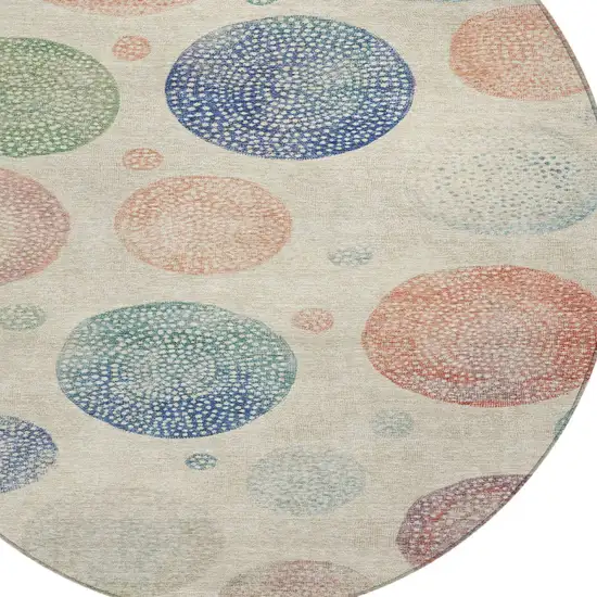 8' Ivory And Peach Round Geometric Washable Indoor Outdoor Area Rug Photo 9