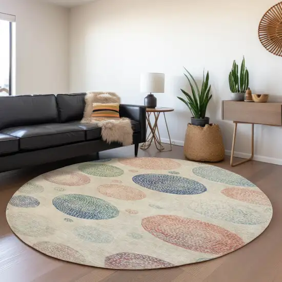 8' Ivory And Peach Round Geometric Washable Indoor Outdoor Area Rug Photo 6