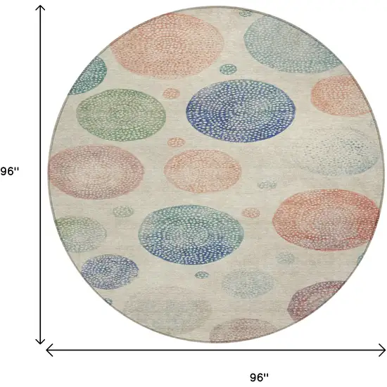 8' Ivory And Peach Round Geometric Washable Indoor Outdoor Area Rug Photo 9