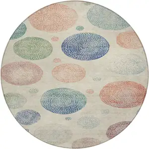 Photo of 8' Ivory And Peach Round Geometric Washable Indoor Outdoor Area Rug
