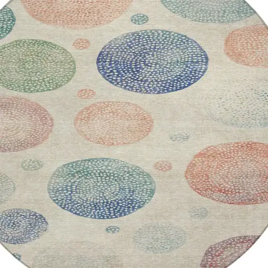 8' Ivory And Peach Round Geometric Washable Indoor Outdoor Area Rug Photo 4