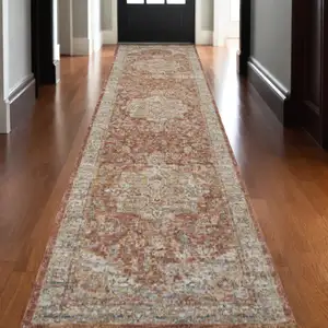 Photo of 10' Ivory And Red Floral Medallion Distressed Runner Rug