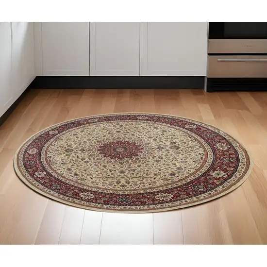 6' Ivory And Red Oriental Round Rug Photo 1