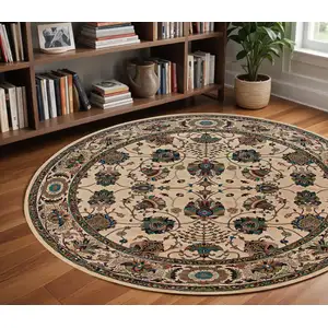 Photo of 8' Ivory And Red Oriental Round Rug