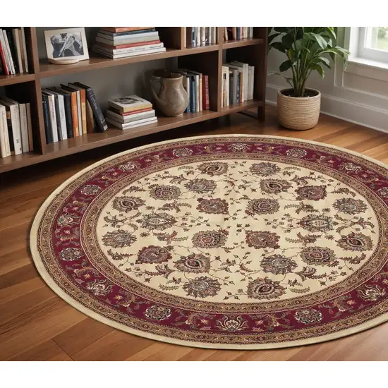 8' Ivory And Red Oriental Round Rug Photo 1