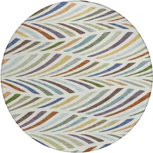 Photo of 8' Ivory And Sage Round Abstract Washable Indoor Outdoor Area Rug