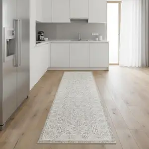 Photo of 8' Ivory And Silver Floral Distressed Non Skid Runner Rug