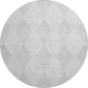 Photo of 8' Ivory And Silver Geometric Washable Round Rug With UV Protection