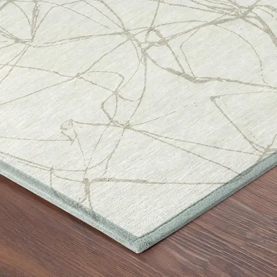 8' Ivory And Silver Round Abstract Washable Indoor Outdoor Area Rug Photo 3