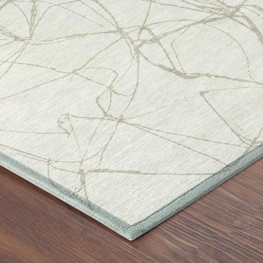 8' Ivory And Silver Round Abstract Washable Indoor Outdoor Area Rug Photo 3