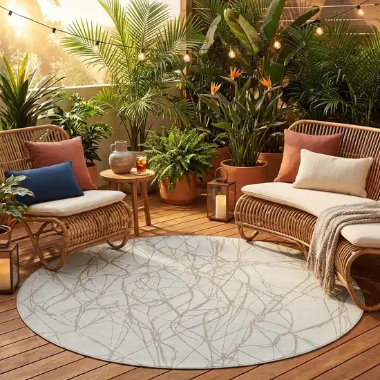 8' Ivory And Silver Round Abstract Washable Indoor Outdoor Area Rug Photo 1