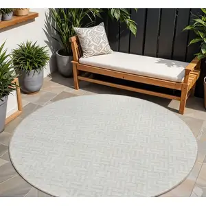 Photo of 8' Ivory And Silver Round Geometric Washable Indoor Outdoor Area Rug