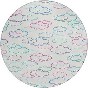 Photo of 8' Ivory And Sky Blue Round Abstract Washable Indoor Outdoor Area Rug