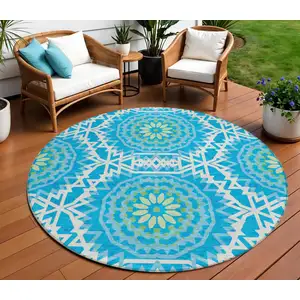 Photo of 8' Ivory And Sky Blue Round Floral Medallion Washable Indoor Outdoor Area Rug
