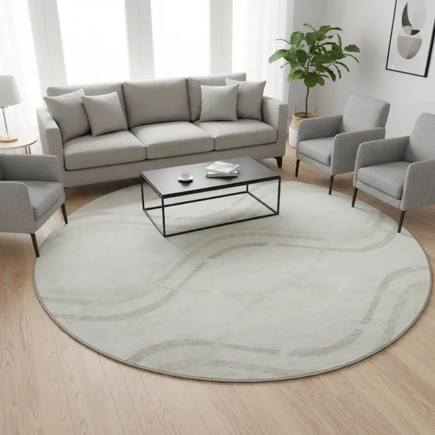 8' Ivory And Taupe Abstract Washable Round Rug With UV Protection Photo 2