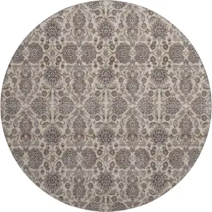 Photo of 8' Ivory And Taupe Floral Washable Round Rug With UV Protection